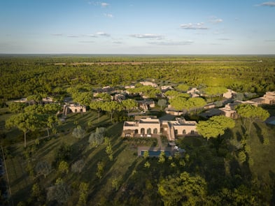 Aerial view of Ando Living Comporta, a luxury development featuring private villas seamlessly integrated into nature. Sustainable architecture and contemporary elegance in the natural landscape of Comporta, Portugal.